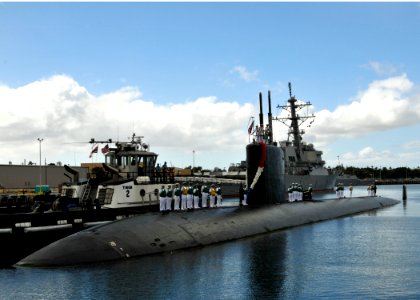 US Navy 111221-N-UK333-045 The Los Angeles-class fast attack submarine USS Columbia (SSN 762) returns to Joint Base Pearl Harbor-Hickam following a photo