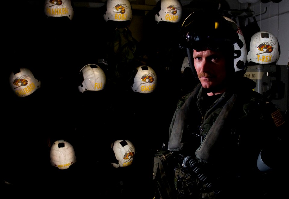 US Navy 111217-N-TZ605-062 Lt. Robert Blackwood, assigned to Strike Fighter Squadron (VFA) 113, poses for a portrait after donning his flight suit