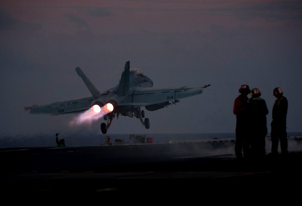 US Navy 111221-N-DR144-418 An F-A-18F Super Hornet assigned to Strike Fighter Squadron (VFA) 22 launches from the flight deck of the Nimitz-class a