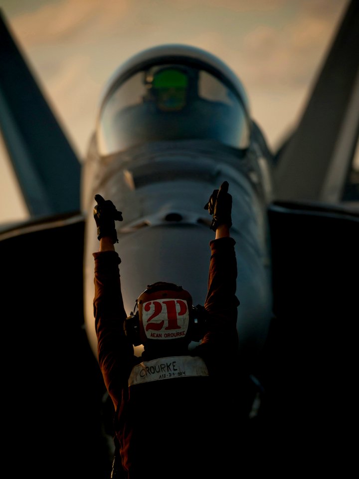 US Navy 111221-N-DR144-167 Aviation Electrician's Mate Airman Seth Orourke, a plane captain assigned to Strike Fighter Squadron (VFA) 81