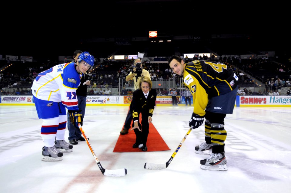 US Navy 111216-N-GS507-113 Capt. Susan K. Cerovsky, commanding officer of Center for Information Dominance drops, the ceremonial puck for the openi