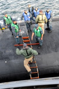 US Navy 111221-N-DI599-018 harbor pilot boards USS North Carolina