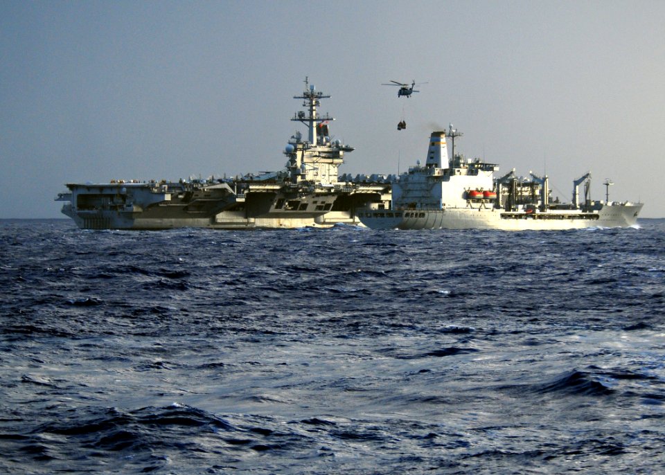 US Navy 111221-N-ZF681-208 The Nimitz class aircraft-carrier USS Carl Vinson (CVN 70) participates in a vertical replenishment with the Military Se