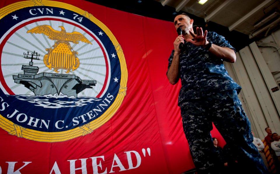 US Navy 111221-N-OY799-489 Capt. Ronald Reis, commanding officer of the the Nimitz-class aircraft carrier USS John C. Stennis (CVN 74), addresses t