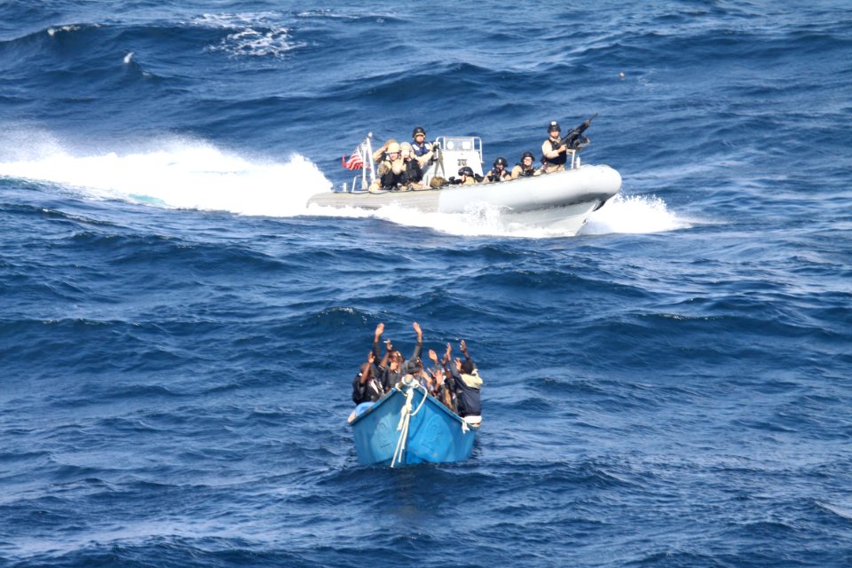 US Navy 111219-N-ZZ999-070 A visit, board, search and seizure team from the guided-missile destroyer USS Pinckney (DDG 91) approaches a suspected p