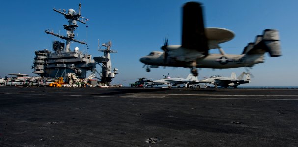 US Navy 111218-N-OY799-655 An E-2C Hawkeye lands aboard the aircraft carrier USS John C. Stennis (CVN 74), marking the Navy's last air mission in s