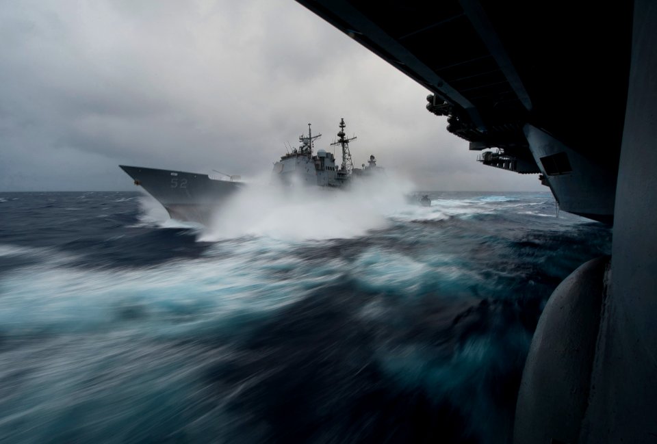 US Navy 111224-N-DR144-439 USS Bunker Hill pulls away after taking on fuel in heavy seas