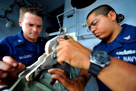 US Navy 111228-N-KS651-068 Sailors prepare a fueling station
