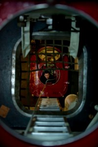 US Navy 111223-N-DR144-203 Interior Communications Electrician Fireman Michael Liermann ascends an access trunk after completing maintenance on the