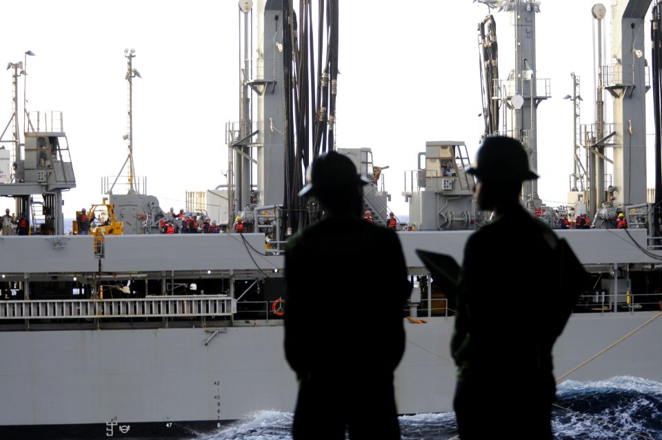 US Navy 111221-N-RG587-451 Sailors assigned to the deck department of the Nimitz-class aircraft carrier USS Carl Vinson (CVN 70) stand by for signa