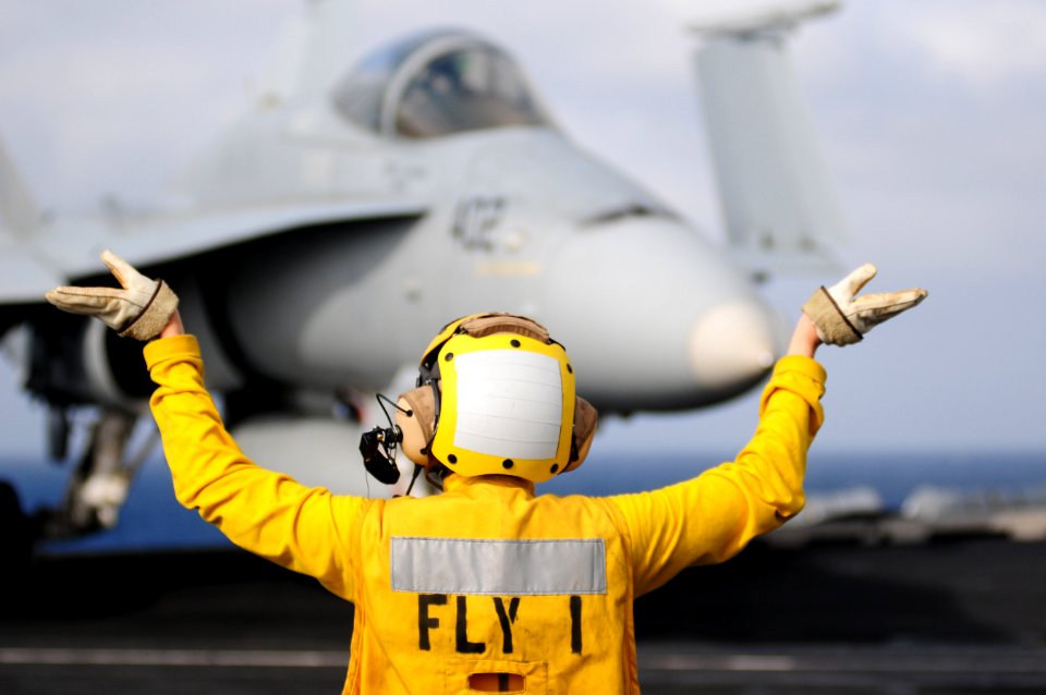 US Navy 111231-N-GZ832-582 Aviation Boatswain's Mate (Handling) 3rd Class Alexis Lebrake, assigned to the air department aboard the aircraft carrie
