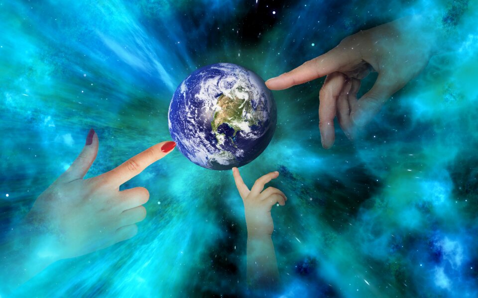 Hands globe universe
