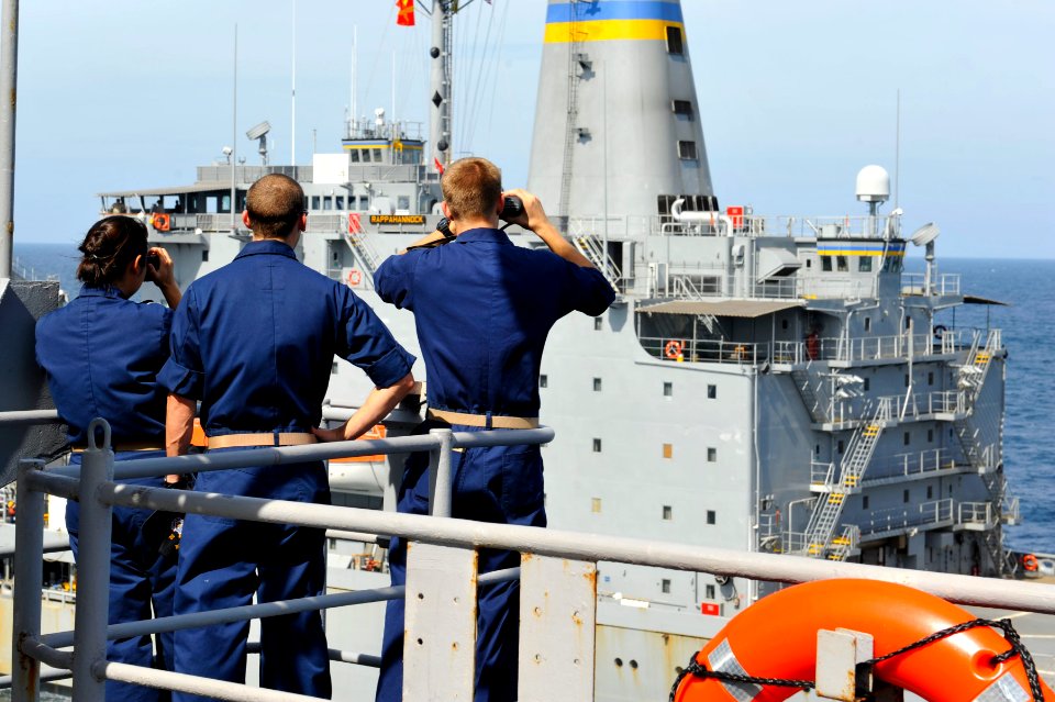 US Navy 111228-N-KS651-232 Sailors man the phone and distance line