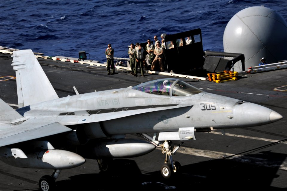 US Navy 111224-N-YB753-029 An F-A-18C Hornet assigned to the Vigilantes of Strike Fighter Squadron (VFA) 151 lands on the flight deck of the aircra