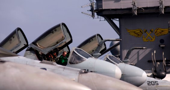 US Navy 111231-N-TZ605-354 Aviation Electrician's Mate 2nd Class Michael Hard, assigned to Electronic Attack Squadron (VAQ) 134, performs a preflig