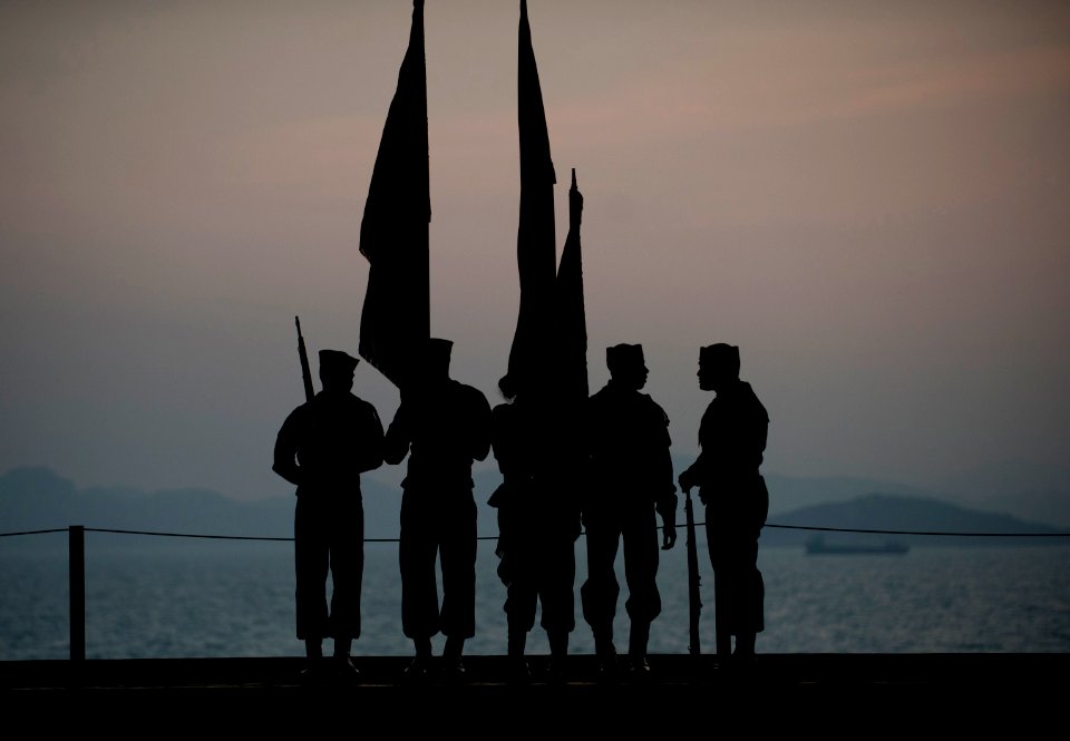 US Navy 111227-N-DR144-600 The Nimitz-class aircraft carrier USS Carl Vinson's (CVN 70) color guard waits to parade the U.S. and Chinese colors bef