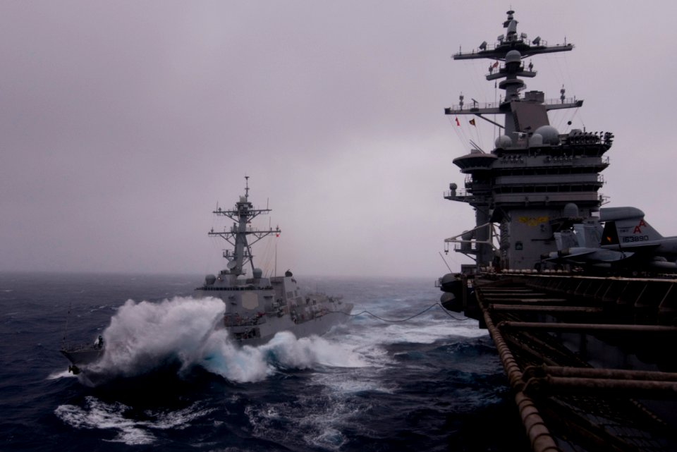 US Navy 111226-N-TZ605-830 USS Halsey and USS Carl Vinson cruise together during a refueling at sea