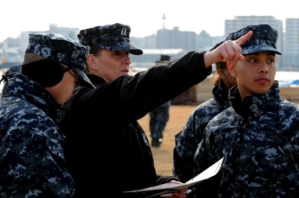 US Navy 120118-N-SP676-264 Lt. Valerie Greenaway directs and organizes efforts with the U.S. 7th Fleet command ship USS Blue Ridge (LCC 19) and emb