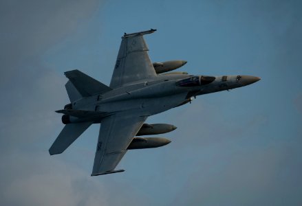 US Navy 120102-N-DR144-571 A jet conducts a fly over while underway