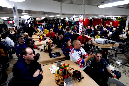 US Navy 120206-N-MD252-308 Sailors watch Super Bowl XLVI aboard the Nimitz-class aircraft carrier USS Carl Vinson (CVN 70)