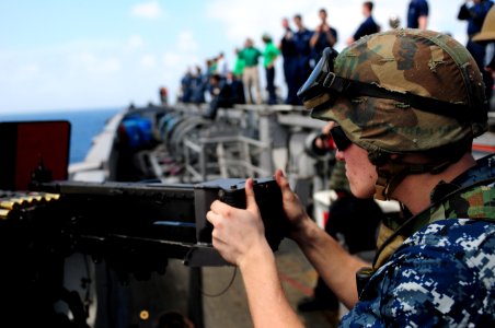 US Navy 120103-N-GZ832-043 Aviation Ordnanceman Airman Johnny-Ryan Jansen, assigned to weapons department aboard the Nimitz class aircraft carrier