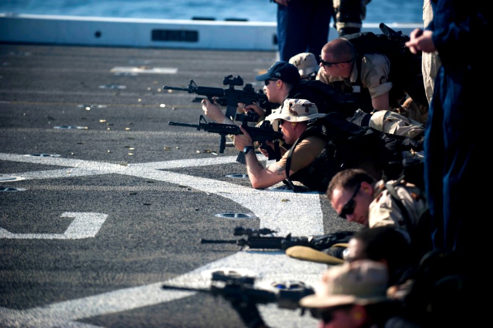 US Navy 111231-N-PB383-514 Sailors assigned to the visit, board, search, and seizure team aboard the amphibious transport dock ship USS New Orleans