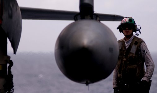 US Navy 111231-N-TZ605-538 Aviation Electronics Technician 3rd Class Mark Clarke, assigned to Electronic Attack Squadron (VAQ) 134, performs a pref