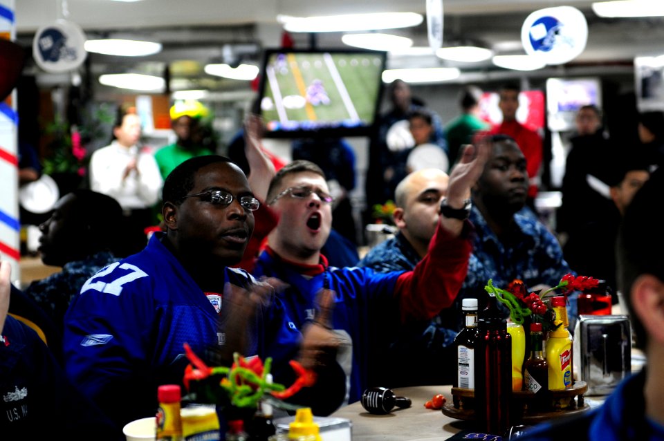 US Navy 120206-N-MD252-463 Sailors watch Super Bowl XLVI aboard the Nimitz-class aircraft carrier USS Carl Vinson (CVN 70)