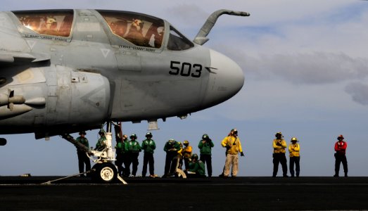 US Navy 120105-N-RG587-296 Sailors prepare an EA-6B Prowler assigned to Electronic Attack Squadron (VAQ) 134, for launch on the flight deck of the
