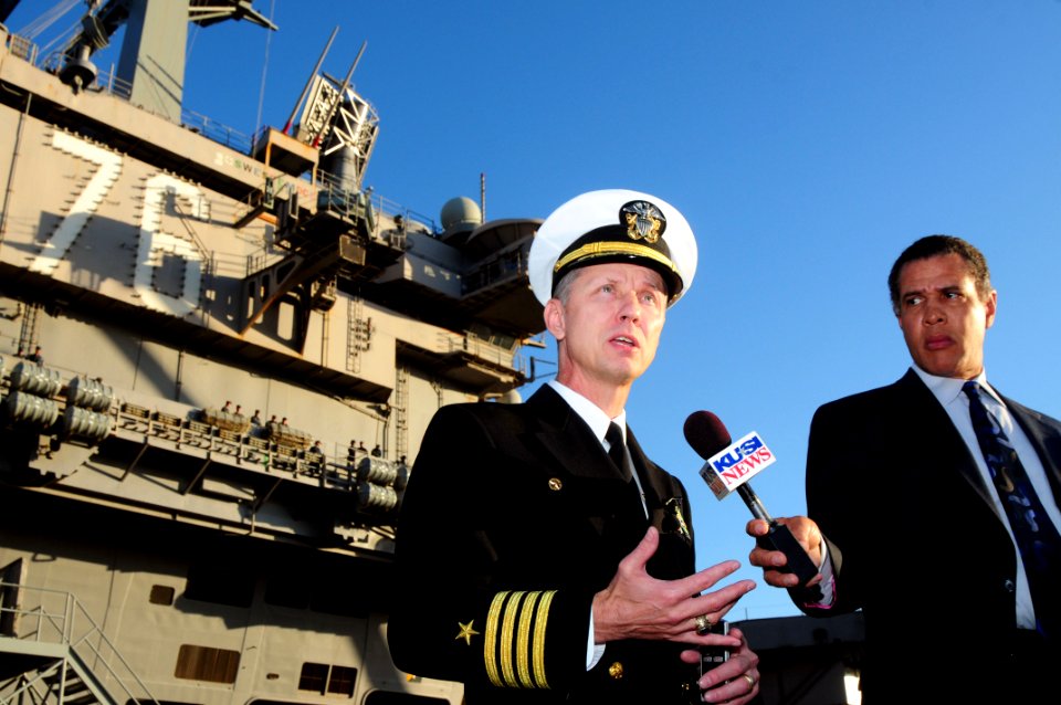 US Navy 120106-N-NB544-033 Capt. Thom Burke, commanding officer of the aircraft carrier USS Ronald Reagan (CVN 76) answers questions during an inte
