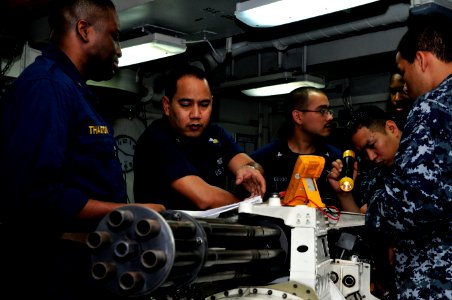 US Navy 120106-N-ZI635-149 Sailors assigned to the aircraft intermediate maintenance department aboard the Nimitz-class aircraft carrier USS Carl V