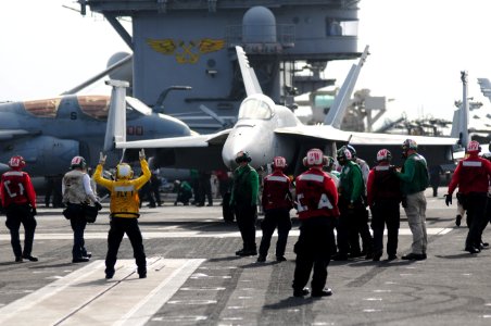 US Navy 111231-N-GZ832-889 An F-A-18E Super Hornet assigned to Strike Fighter Squadron (VFA) 81 is readied for launch on the flight deck of the Nim