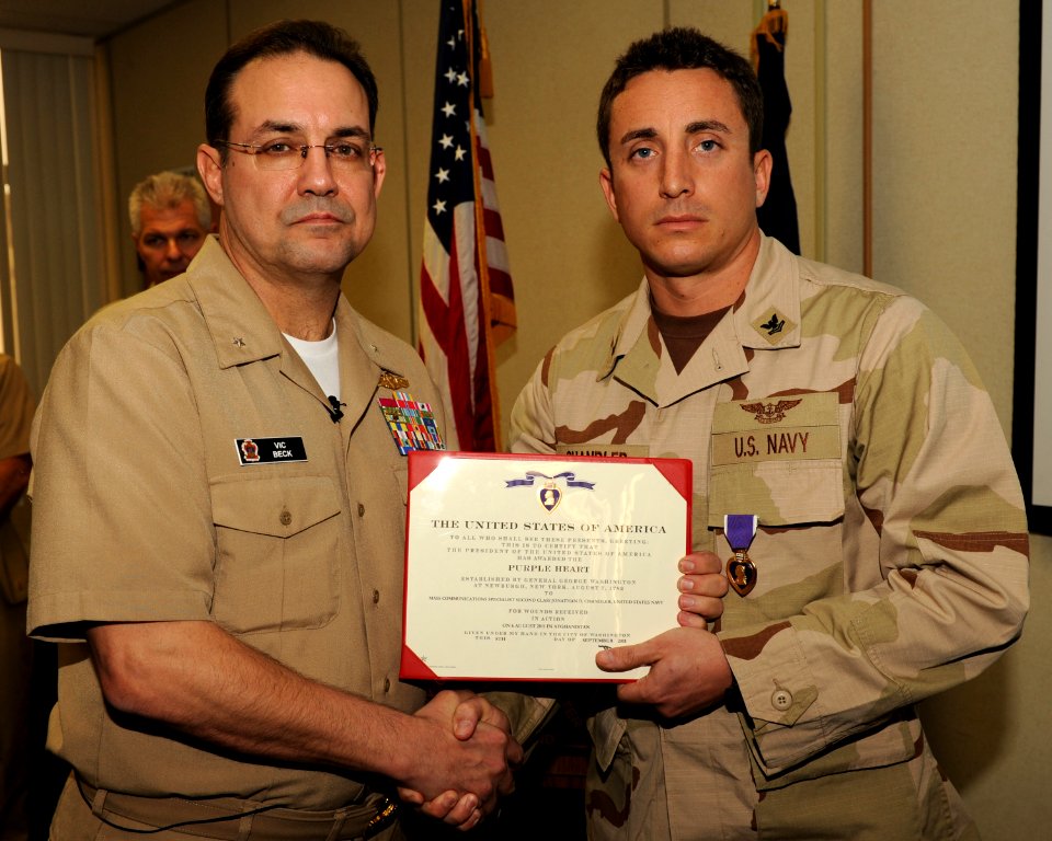 US Navy 120107-N-AZ513-051 A Sailor is awarded the Purple Heart medal