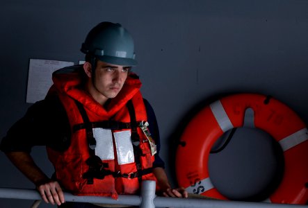US Navy 120105-N-TZ605-165 eaman Zachery Jewell assigned to the deck department aboard the Nimitz-class aircraft carrier USS Carl Vinson (CVN 70) h