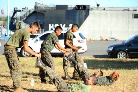 US Navy 120106-N-MN502-118 Cpl. Bradley Brouwer, assigned to the Marine detachment aboard High Speed Vessel (HSV 2) Swift, participates in a physic