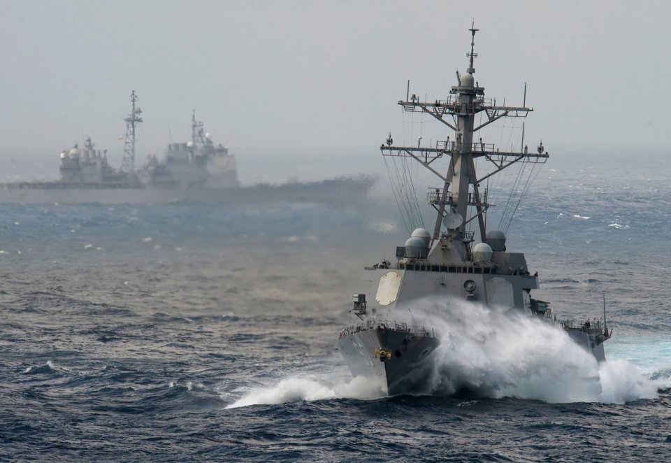 US Navy 120102-N-DR144-067 The Arleigh Burke-class guided-missile destroyer USS Chafee (DDG 90) and the Ticonderoga-class guided-missile cruiser US