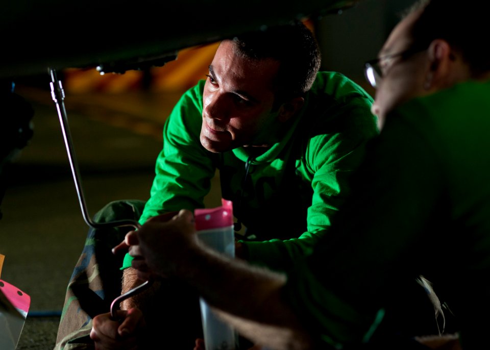 US Navy 120110-N-BT887-132 Aviation Electronics Technician Airman Jonathan McAtee, from Savannah, Ga., removes an antenna panel from an MH-60S Sea