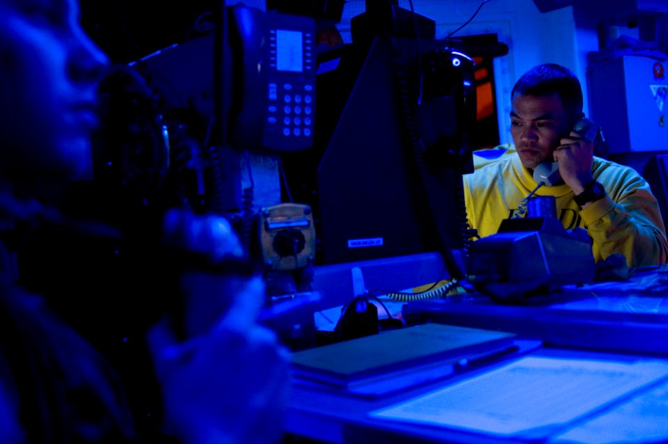 US Navy 120107-N-MD252-149 Chief Aviation Boatswain's Mate (Handling) Stanley Bollinger, a night aircraft handling officer aboard the Nimitz-class