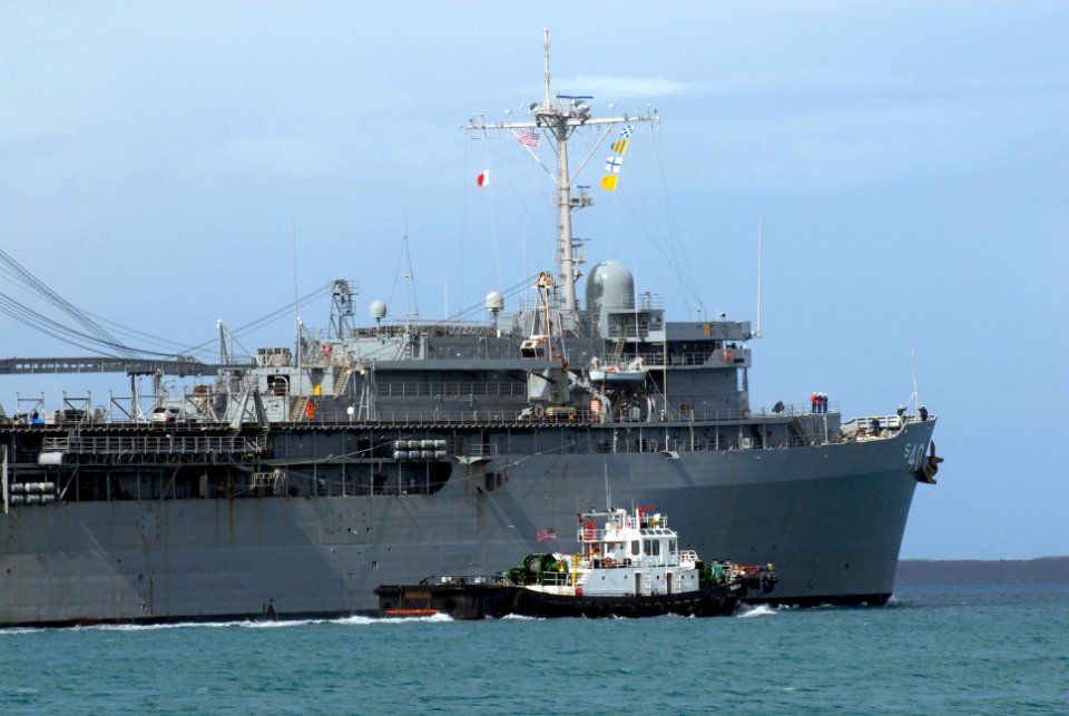 US Navy 120109-N-GE301-027 The submarine tender USS Frank Cable (AS 40) transits Apra Harbor for Portland, Oregon