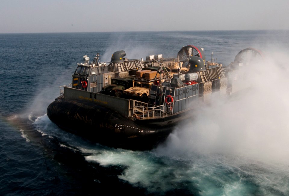 US Navy 120106-N-PB383-070 A landing craft air cushion (LCAC) assigned to Assault Craft Unit (ACU) 5 departs the well deck of the amphibious transp
