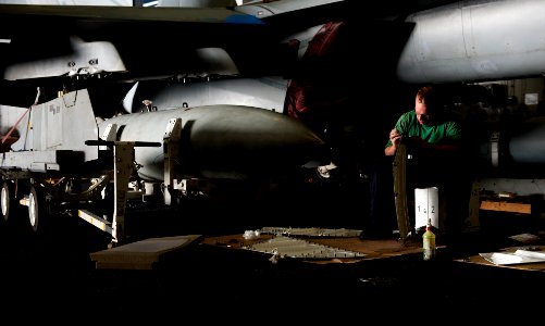 US Navy 120108-N-OY799-250 Aviation Electronics Technician Airman Joseph Carriere, from Church Point, La., performs corrosion prevention on panels
