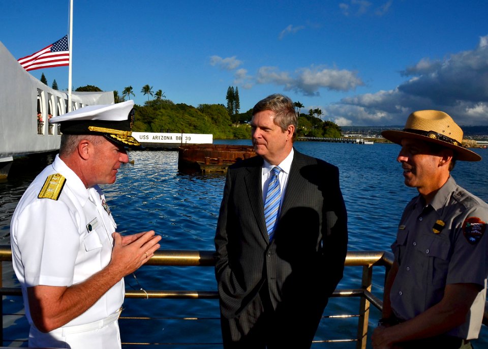 US Navy 120110-N-RI884-077 Secretary of Agriculture Tom Vilsack, center, visits the USS Arizona Memorial with Rear Adm. Glenn Robillard, left, and