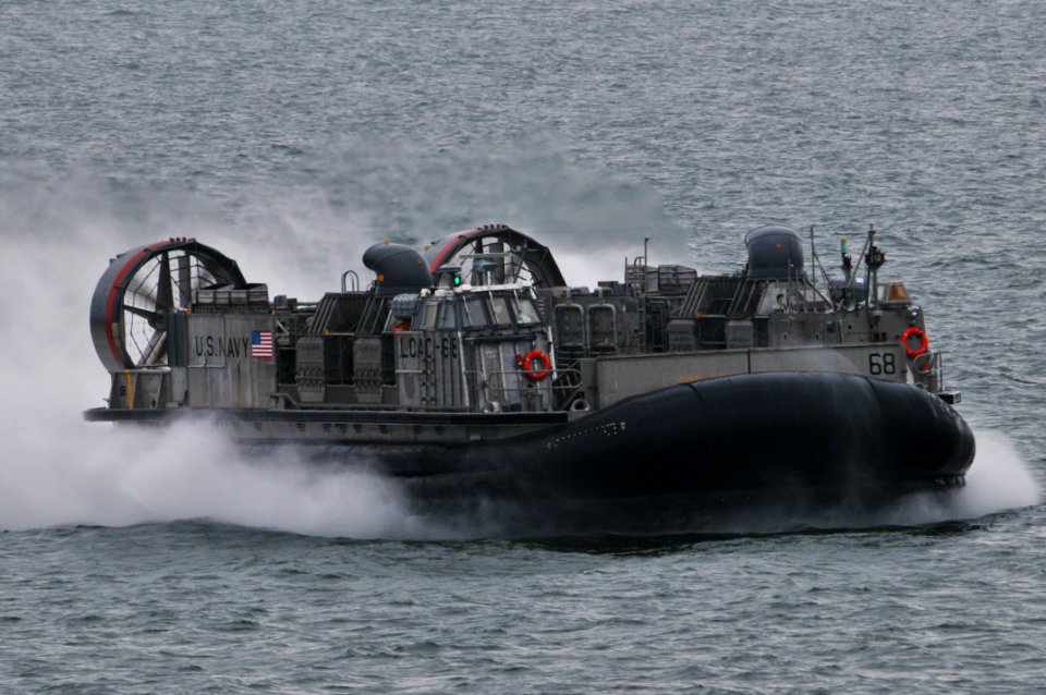US Navy 120111-N-UM734-163 A landing craft air cushion approaches the well deck of the amphibious assault ship USS Kearsarge (LHD 3)