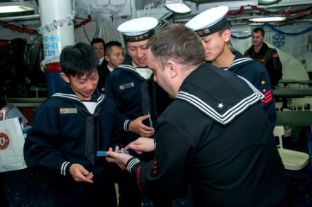 US Navy and Japan Maritime Self-Defense Force Sailors conduct sister ship tours 151218-N-RU971-429