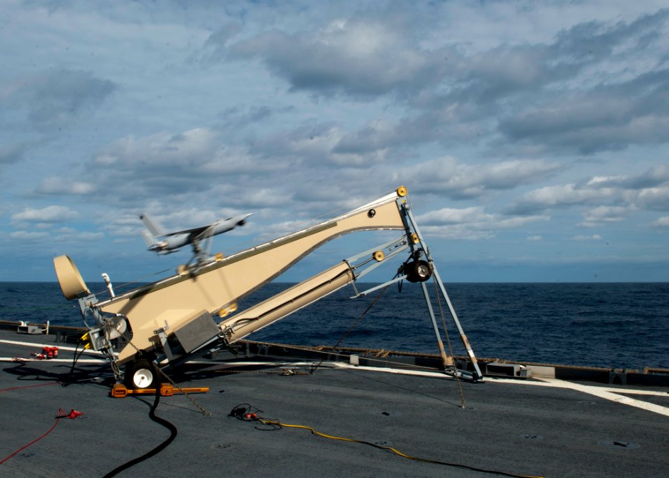 US Navy 120206-N-NR955-022 A Scan Eagle unmanned aerial vehicle (UAV) is launched from the flight deck for simulated reconnaissance