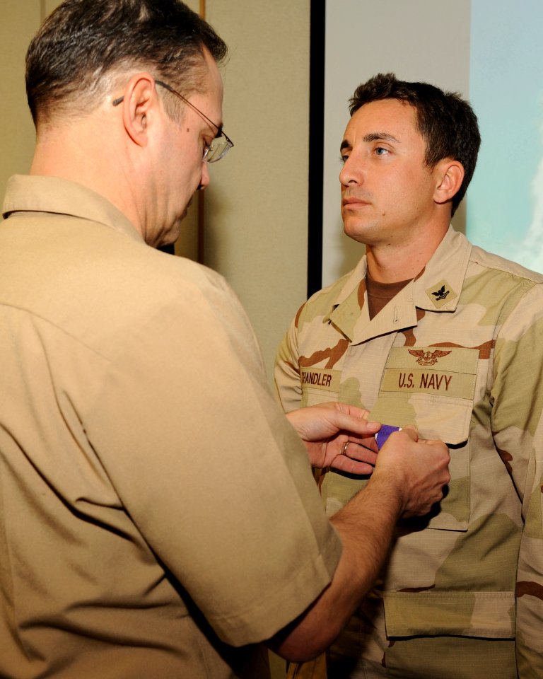US Navy 120107-N-AZ513-042 A Sailor is awarded the Purple Heart medal