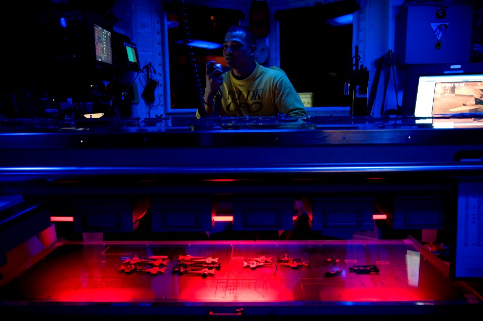 US Navy 120107-N-MD252-131 Chief Aviation Boatswain's Mate (Handling) Stanley Bollinger, a night aircraft handling officer aboard the Nimitz-class