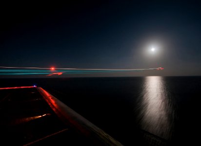 US Navy 120111-N-DR144-083 An F-A-18 Hornet launches from the flight deck aboard the Nimitz-class aircraft carrier USS Carl Vinson (CVN 70)