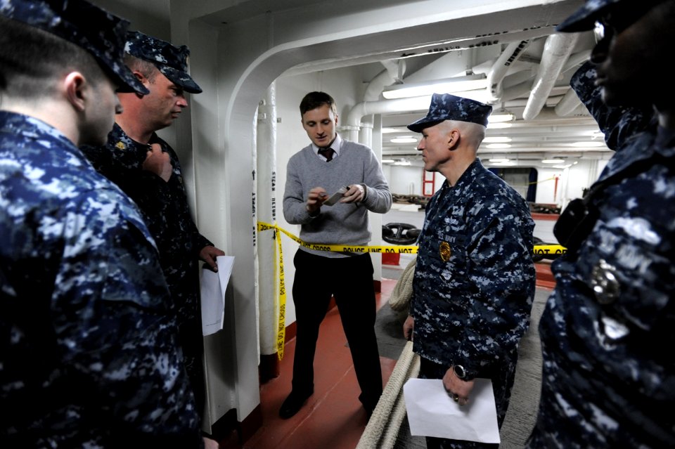 US Navy 120110-N-QQ884-116 Special Agent Jonathan Greenert instructs security personnel stationed aboard the nuclear-powered aircraft carrier USS G