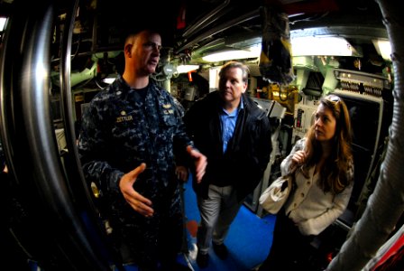 US Navy 120126-N-NK458-017 Cmdr. Gregg Zettler discusses control room operations with U.S. Rep. Mike Rogers